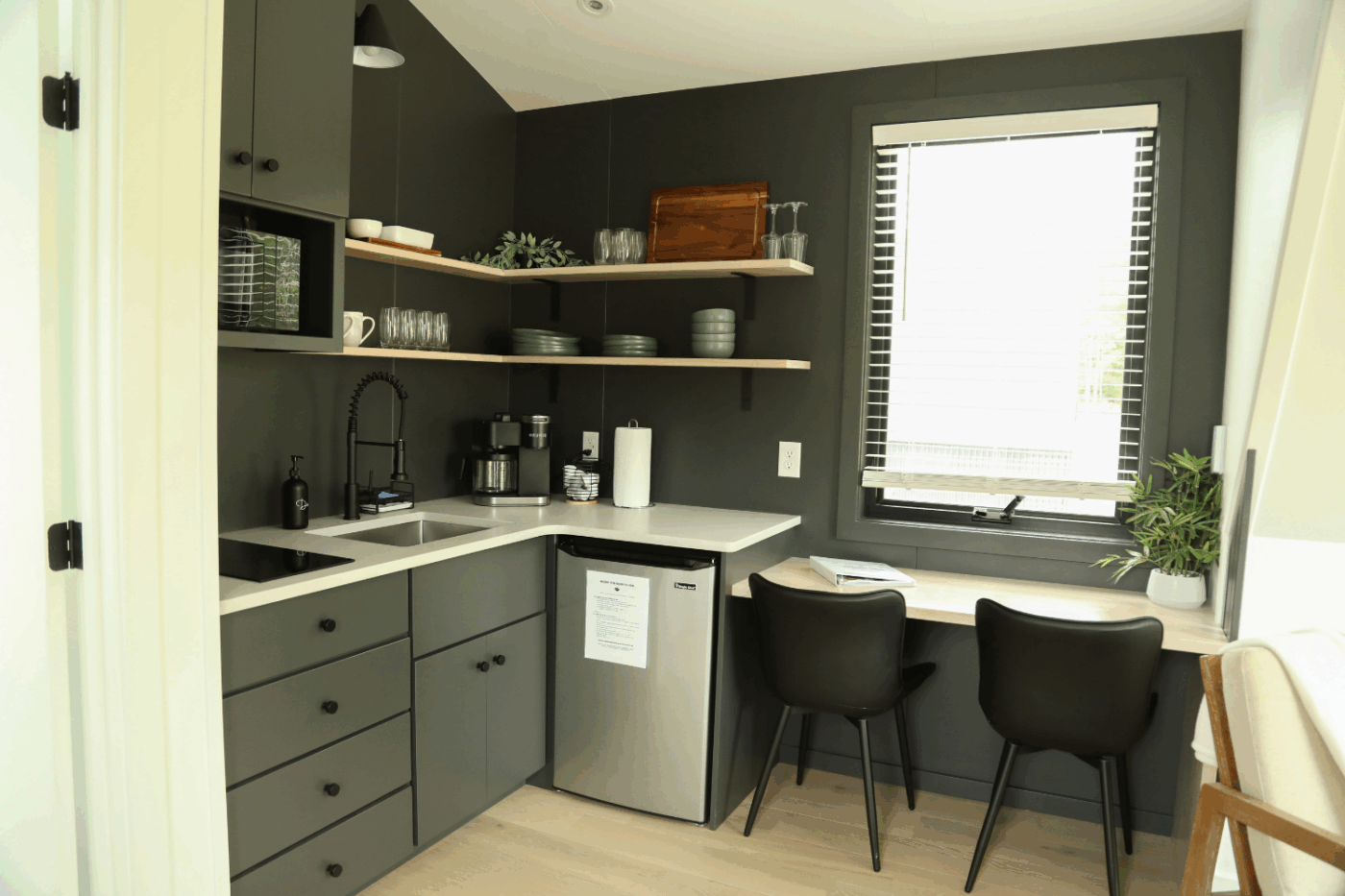 kitchen and dining area of A Frame 26 park model tiny home in Milroy Pa At The HArtman Center