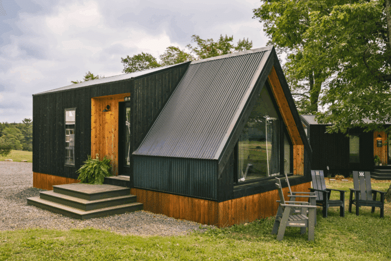 A Frame Park Model tiny home entrance in friedens pa somerset resort site 11 metal and wood siding Zook cabins