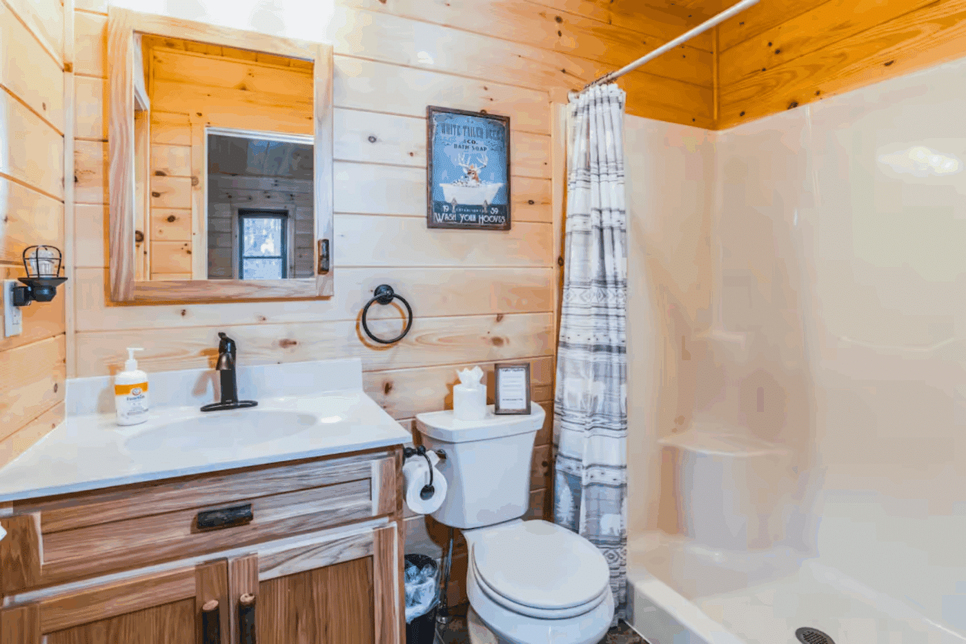 full bathroom with walk in shower in mountaineer deluxe located in old forge new york