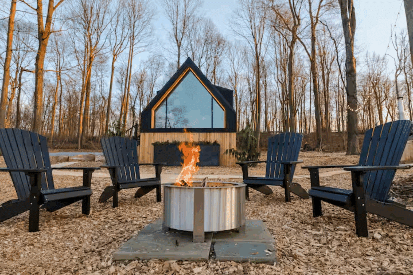 outdoor entertainment area in Gap Pa with A frame park model tiny home built by and designed by Psy Homes